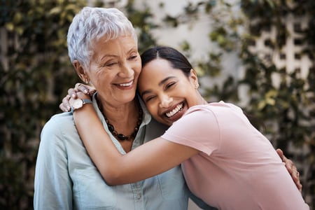 daughter hugging mom